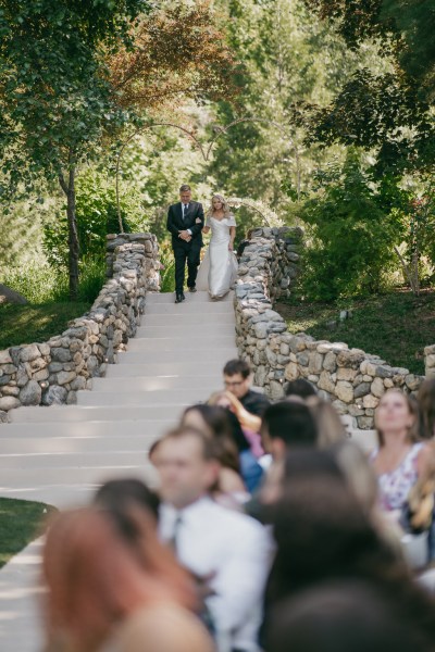 Father of the bride walks his daughter down the aisle