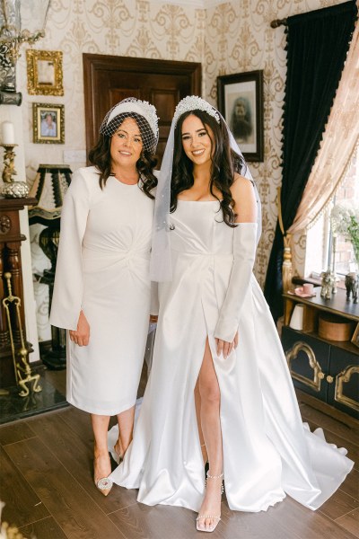 Mother and daughter pose for a photo