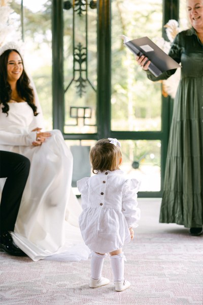 Little girl celebrant bride and groom