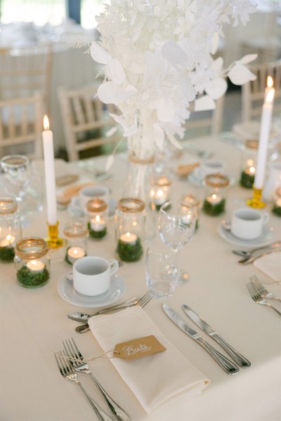 Table setting with glasses candles and decorations