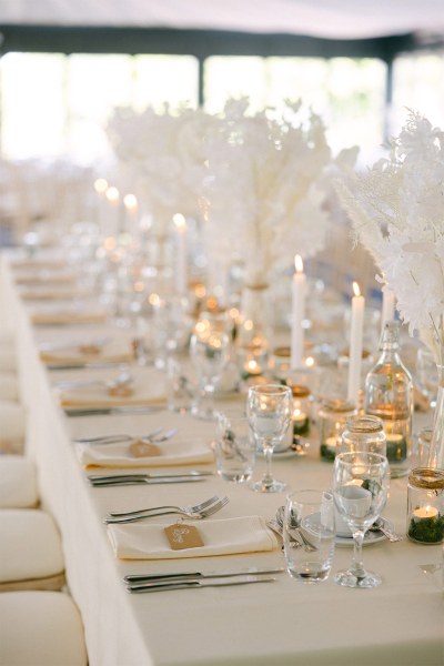 Table setting with glasses candles and decorations