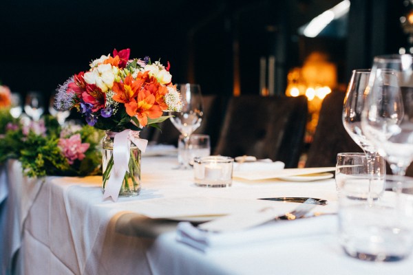 orange flowers table setting dining room