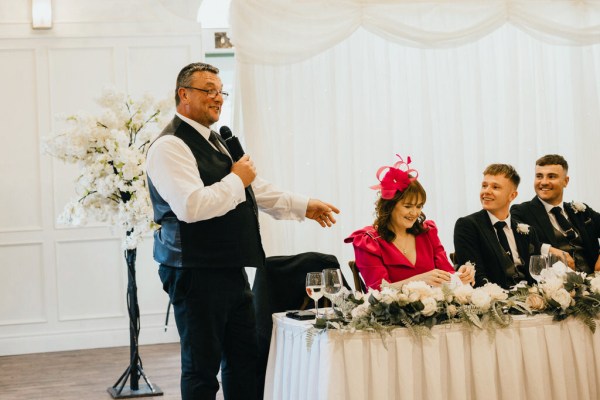 father/groomsman gives speech