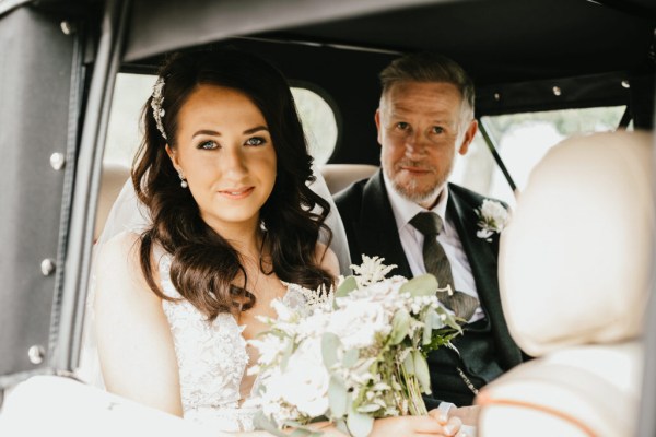 father of the bride in the wedding car together