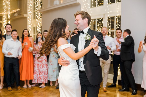 bride and groom dance on the dancefloor together