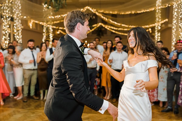 bride and groom dance on the dancefloor together