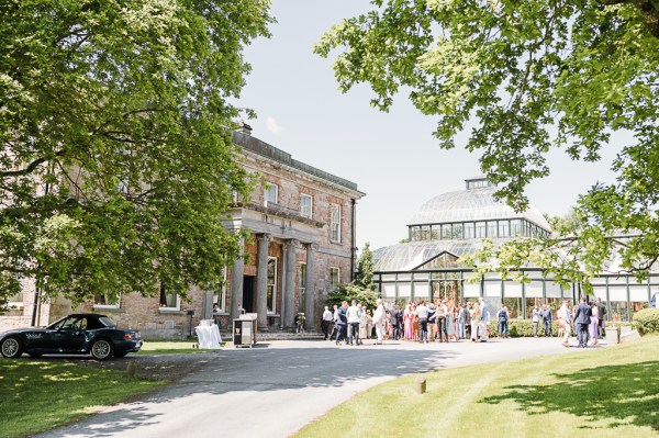 atmosphere shot of guests outside venue