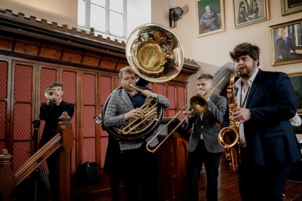 wedding band musician playing trumpet