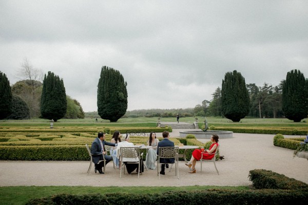 atmosphere shot of guests seated outside venue