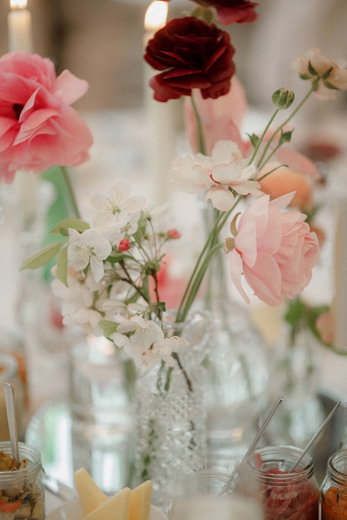 flowers pink roses in vases with water