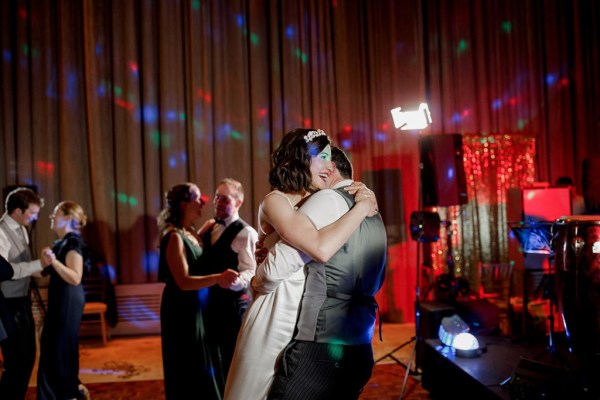 bride and groom dance on the dancefloor together