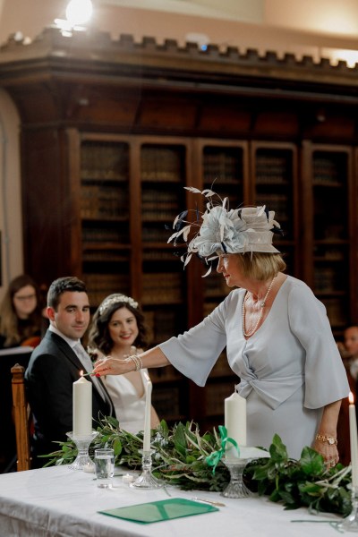 woman lighting the candle mother witness