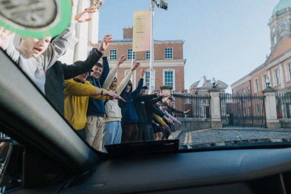 front view of car guests cheer