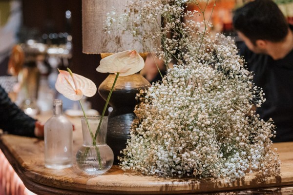 glasses on table flowers