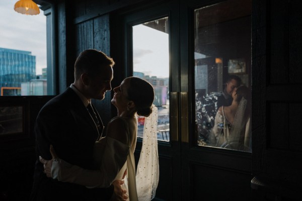 bride and groom kissing silhouette image