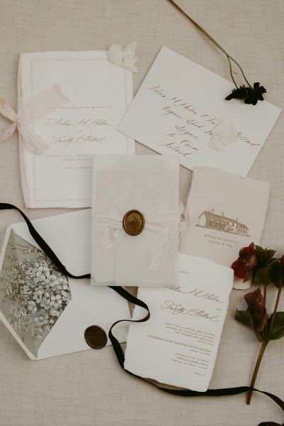 letters notes RSVP black ribbon and rose