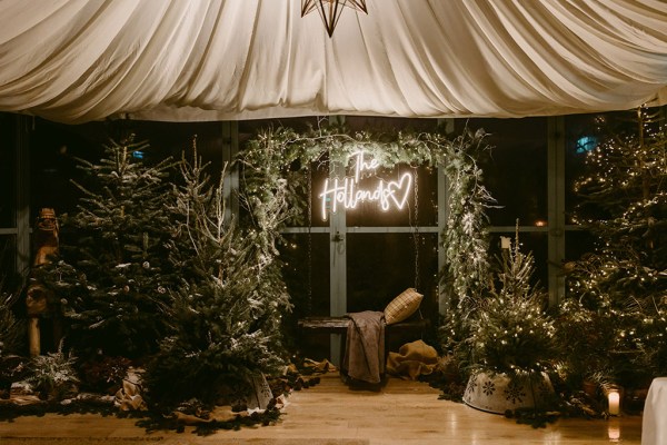 light up name sign in dining room ivy draped