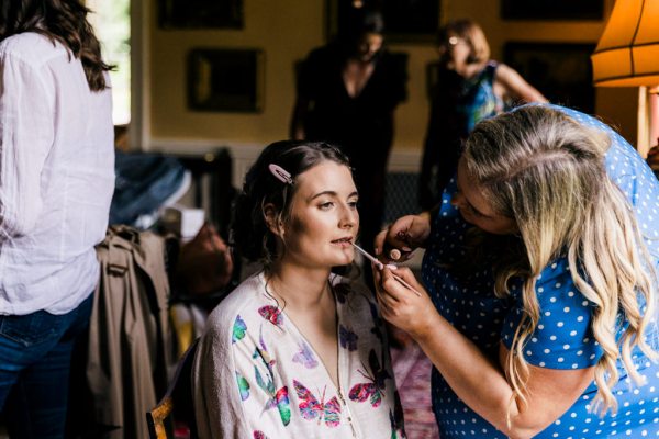 bride getting her makeup done MUA