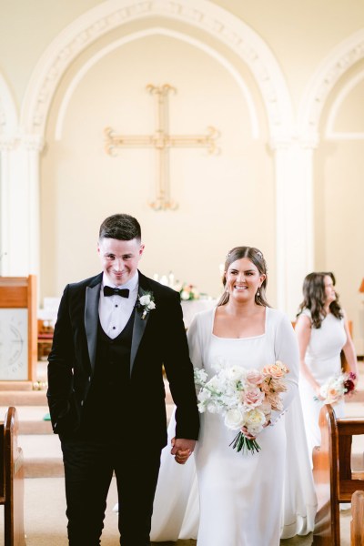 bride and groom exit church ceremony