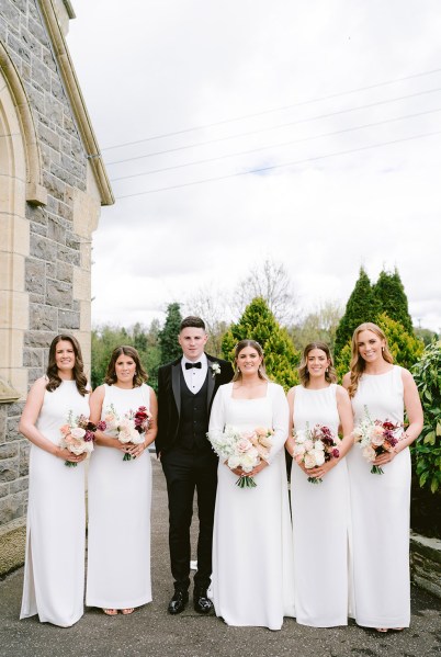 groom bride and bridesmaids