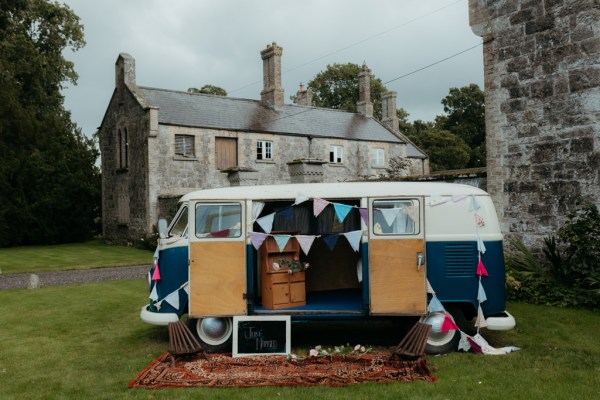 little van covered in decorations