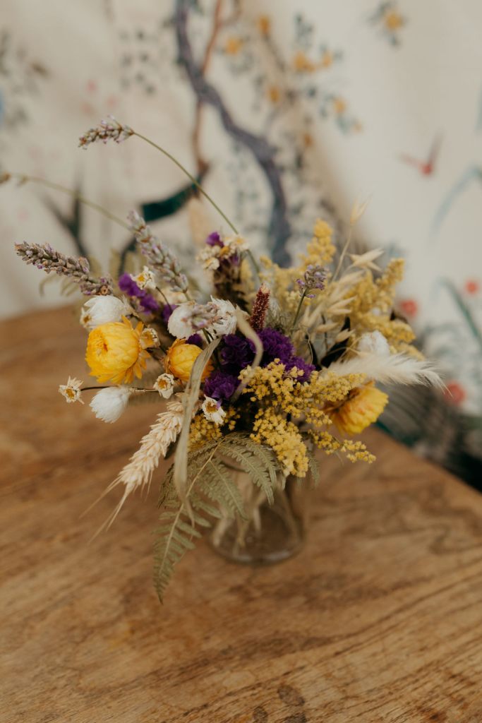 flower vase resting on table