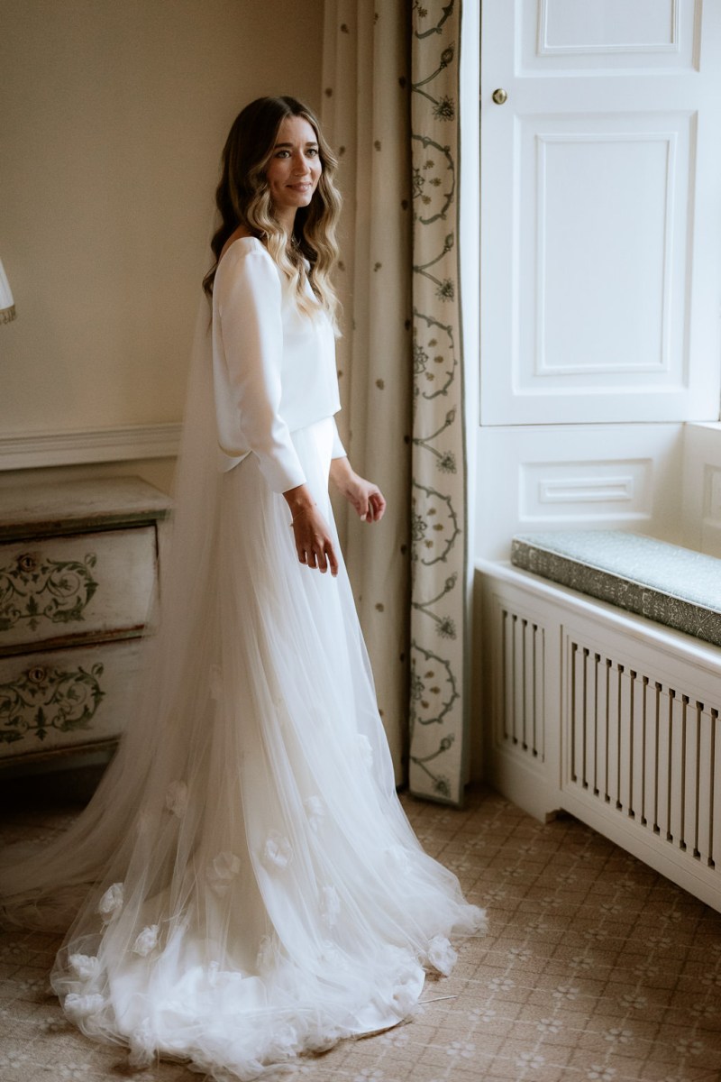 bride is ready and looking out window