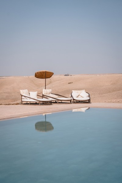 pool sunbeds and sand