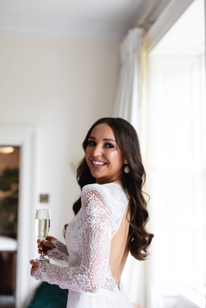 smiling bride over the shoulder