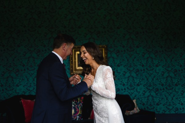 father of the bride hugs daughter emotional moment they laugh