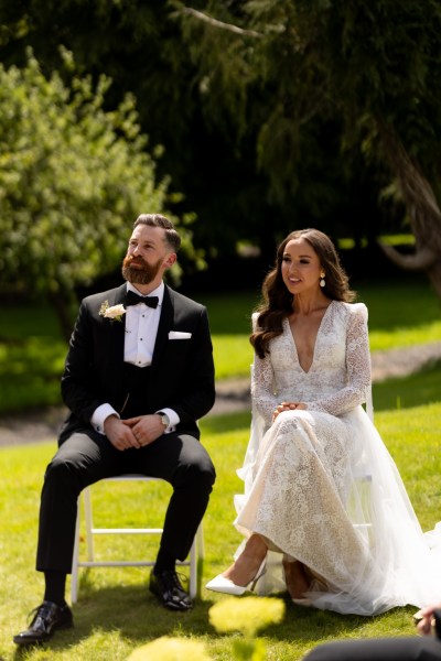 bride and groom are reunited at the alter