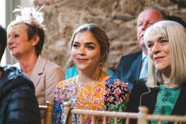 woman guest smiles in audience