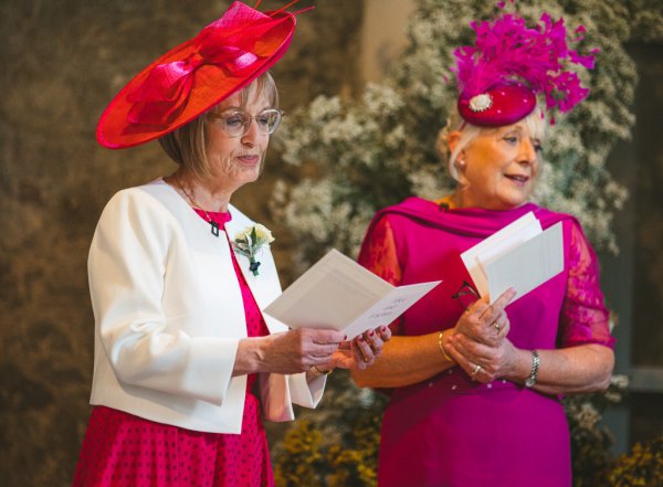 mothers reading from booklet pamphlet