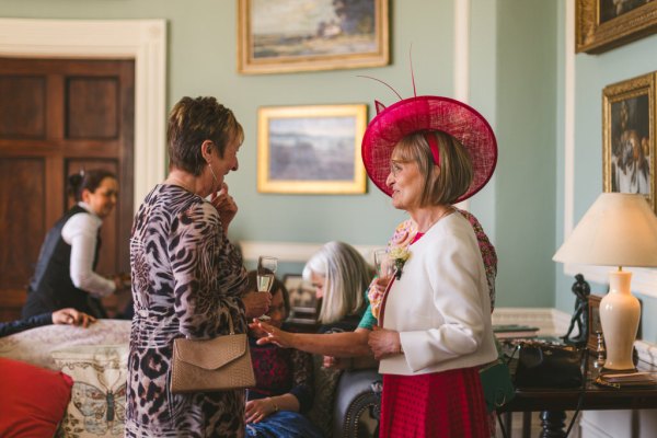 guests chatting drinking mother