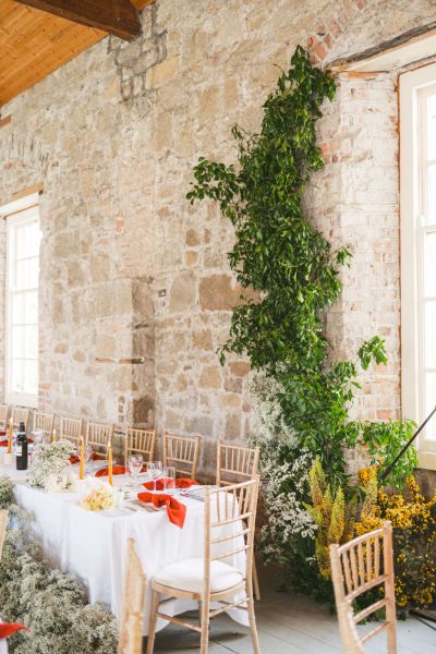 top table for bride and groom interior setting candles lit