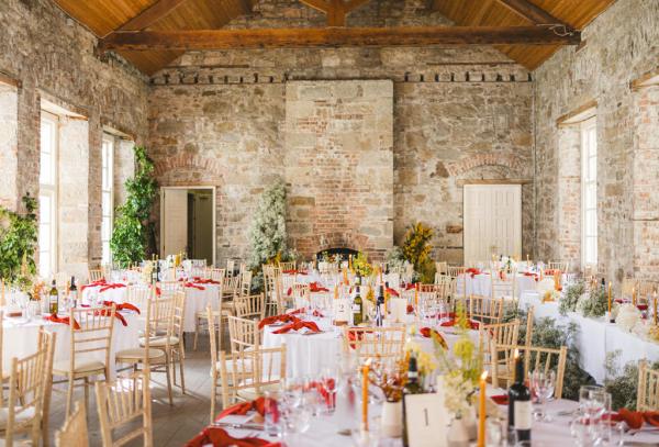 top table for bride and groom interior setting candles lit