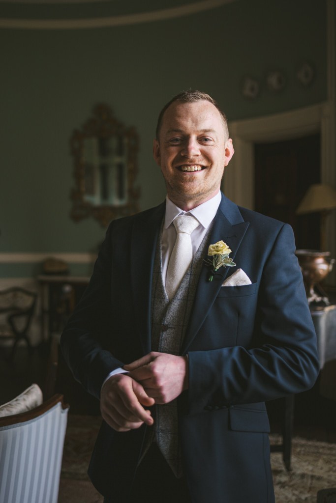 smiling groom