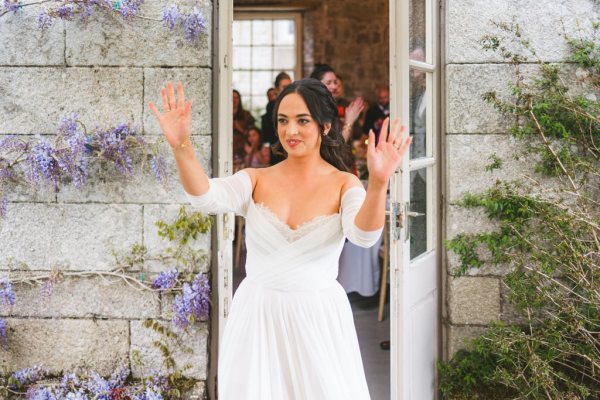 bride gestures outside