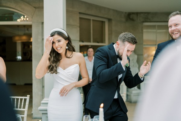 Bride and groom enter reception