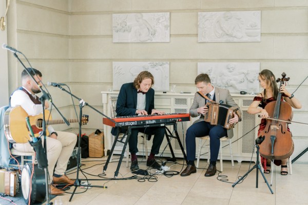 Musicians play during a wedding ceremony