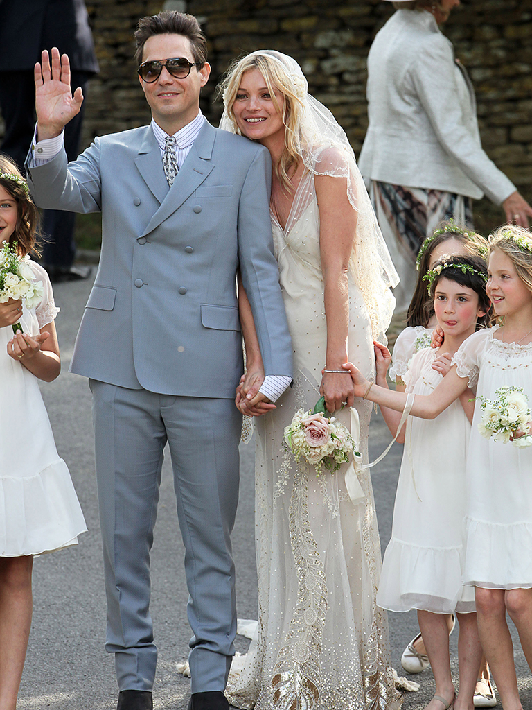 Jamie Hince and Kate Moss outside the church after their wedding on July 1, 2011 in Southrop, England.