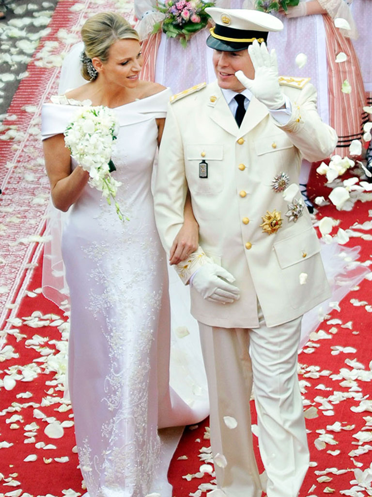 Princess Charlene of Monaco and Prince Albert II of Monaco leave the religious ceremony of the Wedding at the Prince's Palace, in Monaco. (Photo by Stephane Cardinale/Corbis via Getty Images)