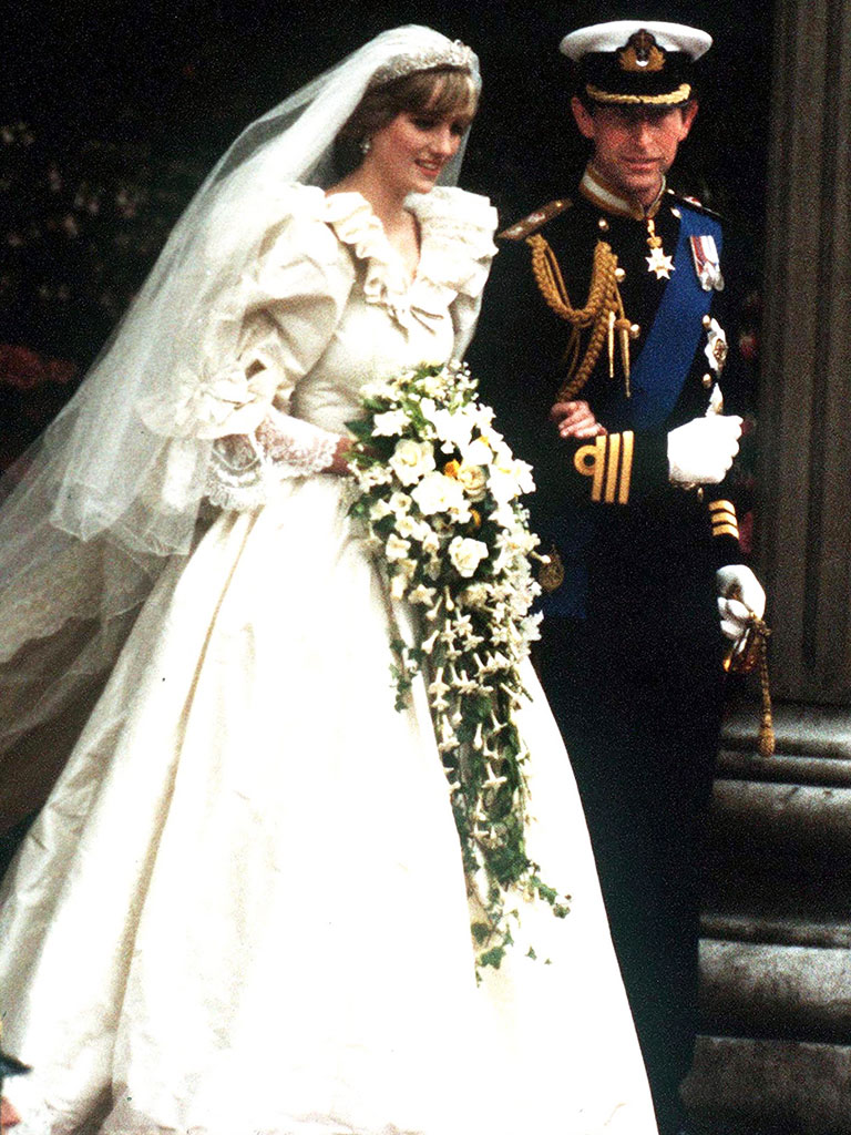 The Prince and Princess of Wales leave St Paul's Cathedral after their wedding, 29th July 1981. She wears a wedding dress by David and Elizabeth Emmanuel and the Spencer family tiara. (Photo by Jayne Fincher/Princess Diana Archive/Getty Images)