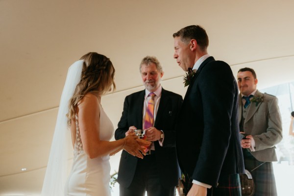 celebrant bride and groom at alter