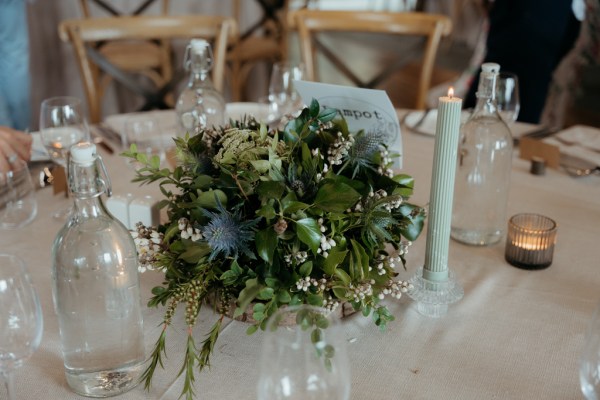 flowers resting in vase on table dining room