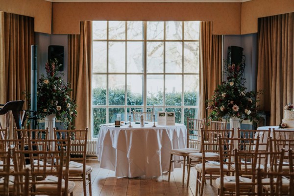 alter setting wedding room chairs and large window