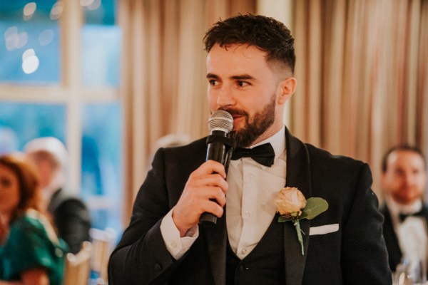 groomsman gives speech