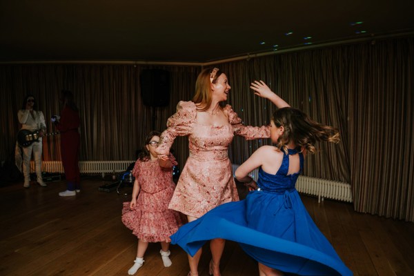 little girls and mother on the dancefloor dancing