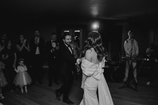 bride and groom dancing on the dancefloor black and white shot