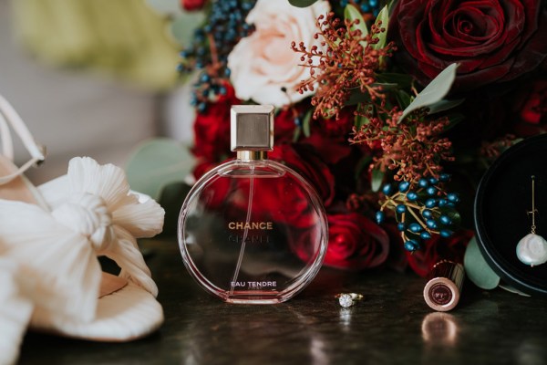 perfume bottle and flowers